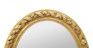 antique-giltwood-oval-mirror-rubans-and-flowers-ornaments-circa-1880